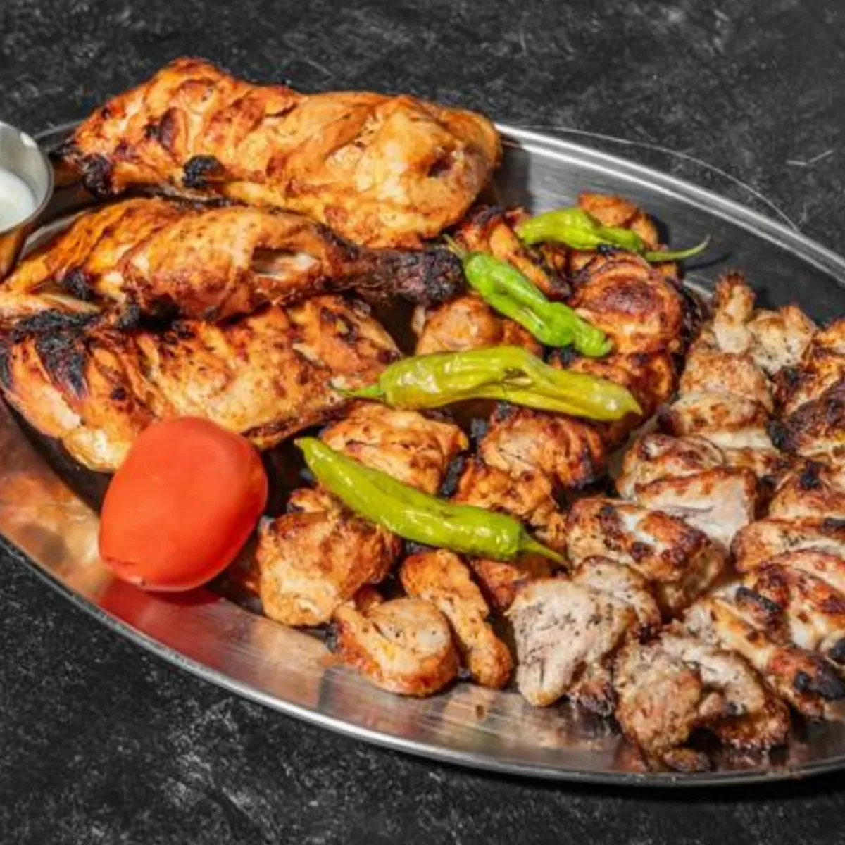 Halal chicken tikka, kabob and malai boti platter at BBQ Toni8ht