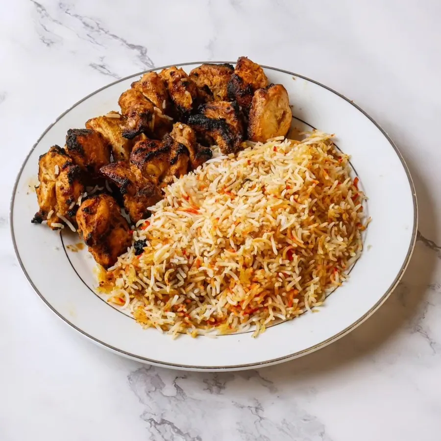 Chicken tikka biryani from BBQ Toni8ht in Pompano Beach
